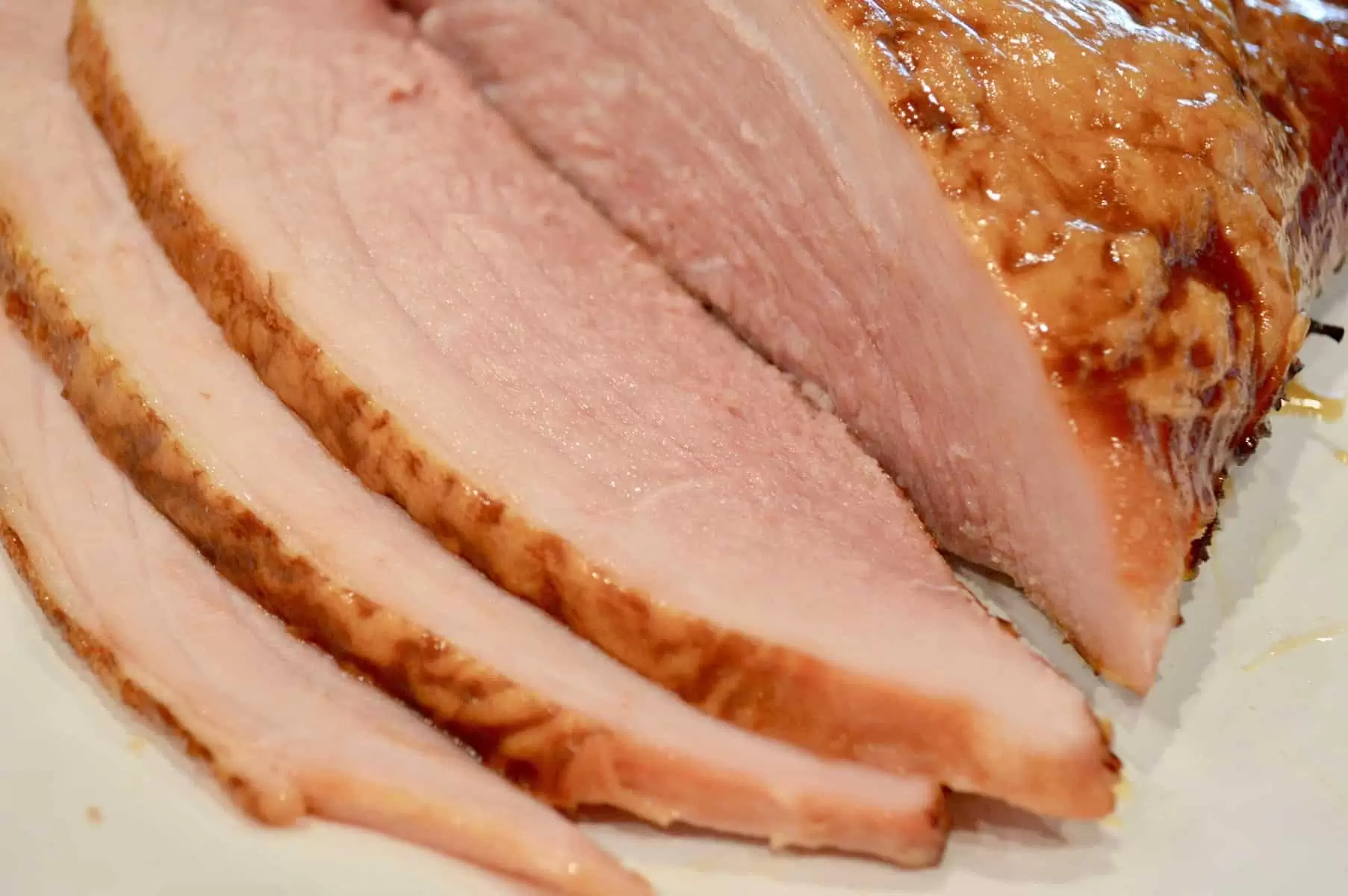 Slow Cooker Ham with Brown Sugar Glaze is so easy to make in your Crockpot! Best Brunch Recipes. This easy healthy recipe is great for the holidays, easter, or just during the week. So simple, makes great leftovers, and can be done with boneless or spiral sliced ham. #crockpot #slowcooker #ham #easyrecipe #easter #weeknightdinner #healthyrecipe #simple #leftovers