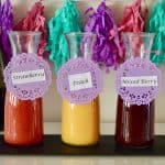 Bellini Bar is a fun brunch cocktail to serve guests. Bellni is the new mimosa and features peach, strawberry, and mixed berry puree with proseccco. #bellini #bellinibar #mimosa #brunchcocktail #brunchdrink #prosecco #champagne #easy #easyrecipe