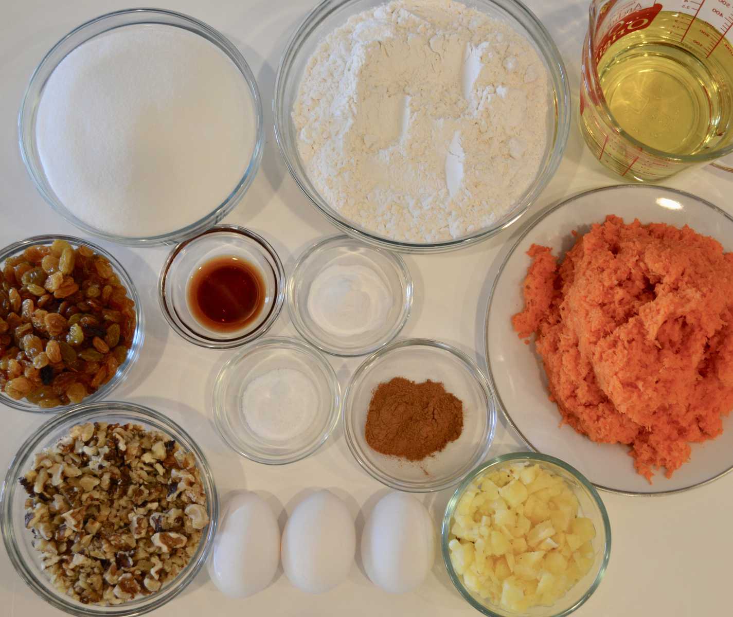 Ingredients for Carrot Pineapple Cake on a white background 