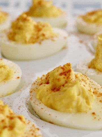Easy Deviled Eggs are the best classic recipe that is easy and healthy. This budget-friendly appetizer is delicious and so easy. #deviledeggs #eggs #appetizer #brunch #breakfast #babyshower #bridalshower #budget #holidays #easter #christmas #best #classic #easyrecipe