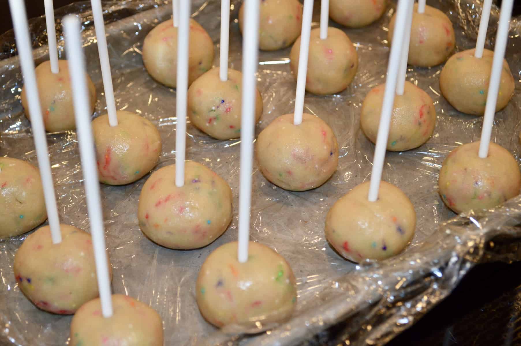 sticks inserted into the cake pops. 