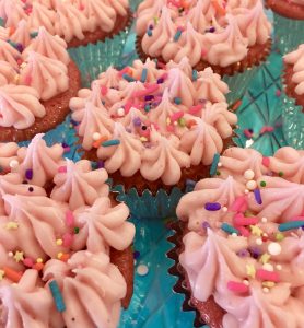 Strawberry Cupcakes with strawberry cream cheese frosting and sprinkles 