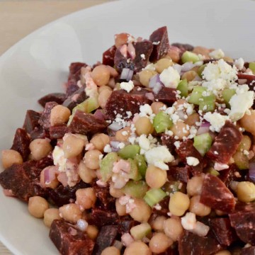 Beet Salad with Garbanzo Beans in a white bowl.