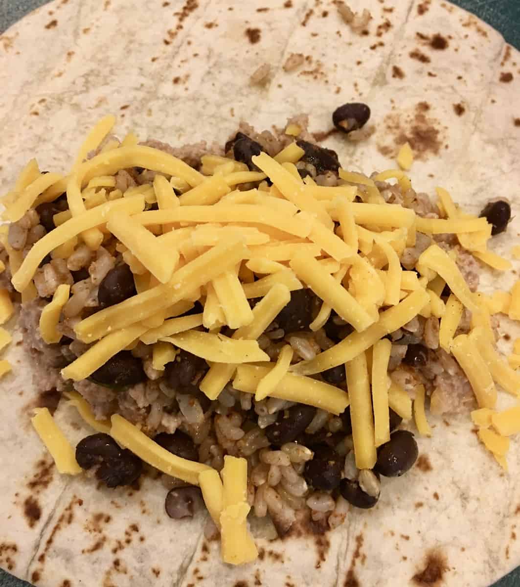 mixture placed in the middle of the tortilla. 