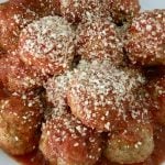 Make-Ahead Turkey Meatballs are healthy and delicious using ground turkey. These classic Italian meatballs are sure to a family favorite! #turkeymeatballs #meatballs #healthy #weeknightdinner #makeahead #partyfood #partyappetizer #parenting #kidsfood
