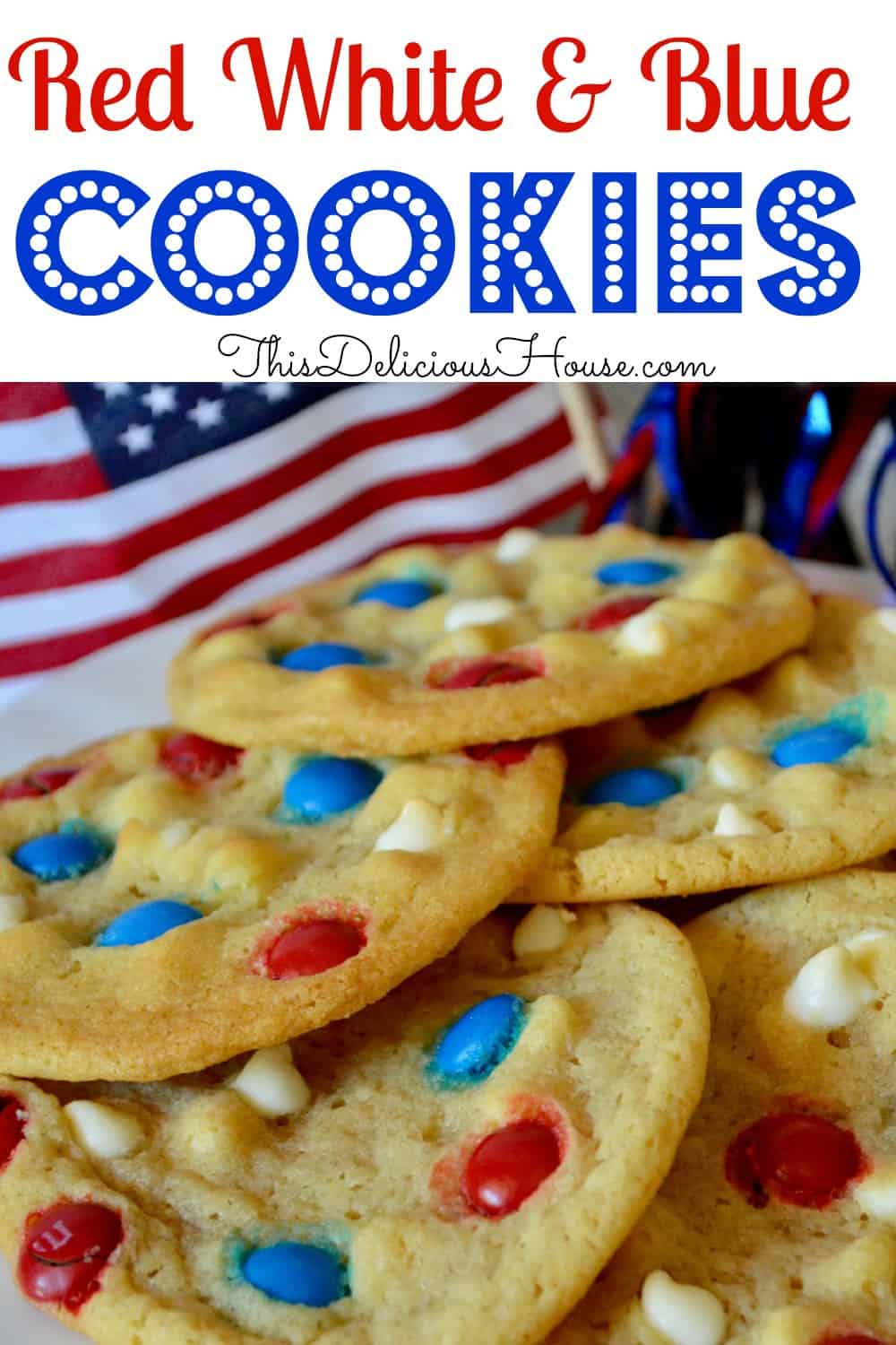 patriotic red white and blue M&M cookies with American flag in background 