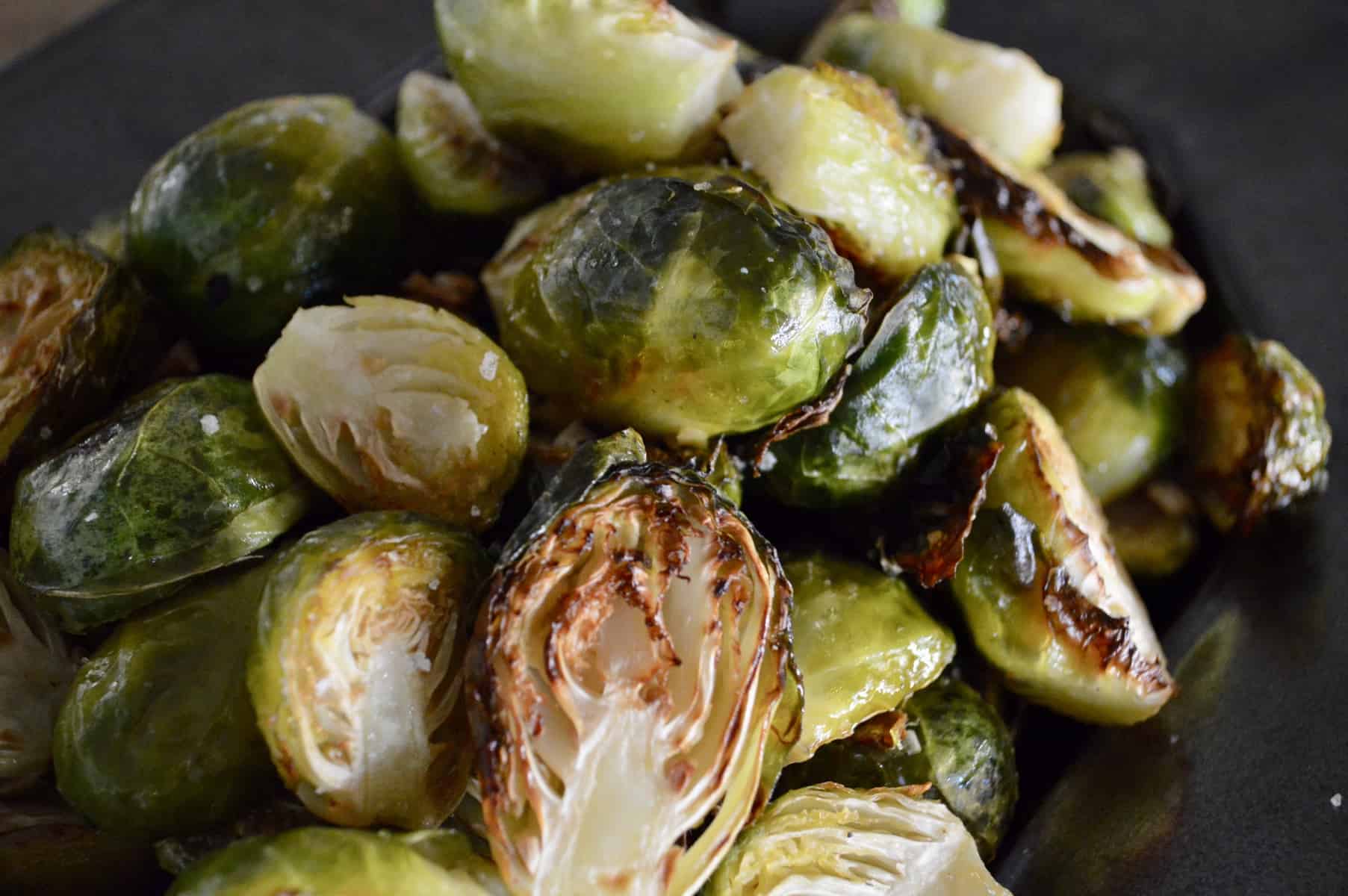 roasted Brussels sprouts with garlic pilled high on a serving platter