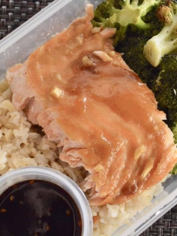 Meal Prep Salmon & Broccoli. Meal prep for the week with this healthy, clean eating, recipe for weight loss. Great for lunch or dinner, this easy Salmon & Broccoli with brown rice and teriyaki sauce is simple and delicious. #mealprep #mealplanning #lunchrecipe #dinnerrecipe #sheetpanrecipe #sesamesalmon #roastedbroccoli #healthy #weightloss #cleaneating #fortheweek