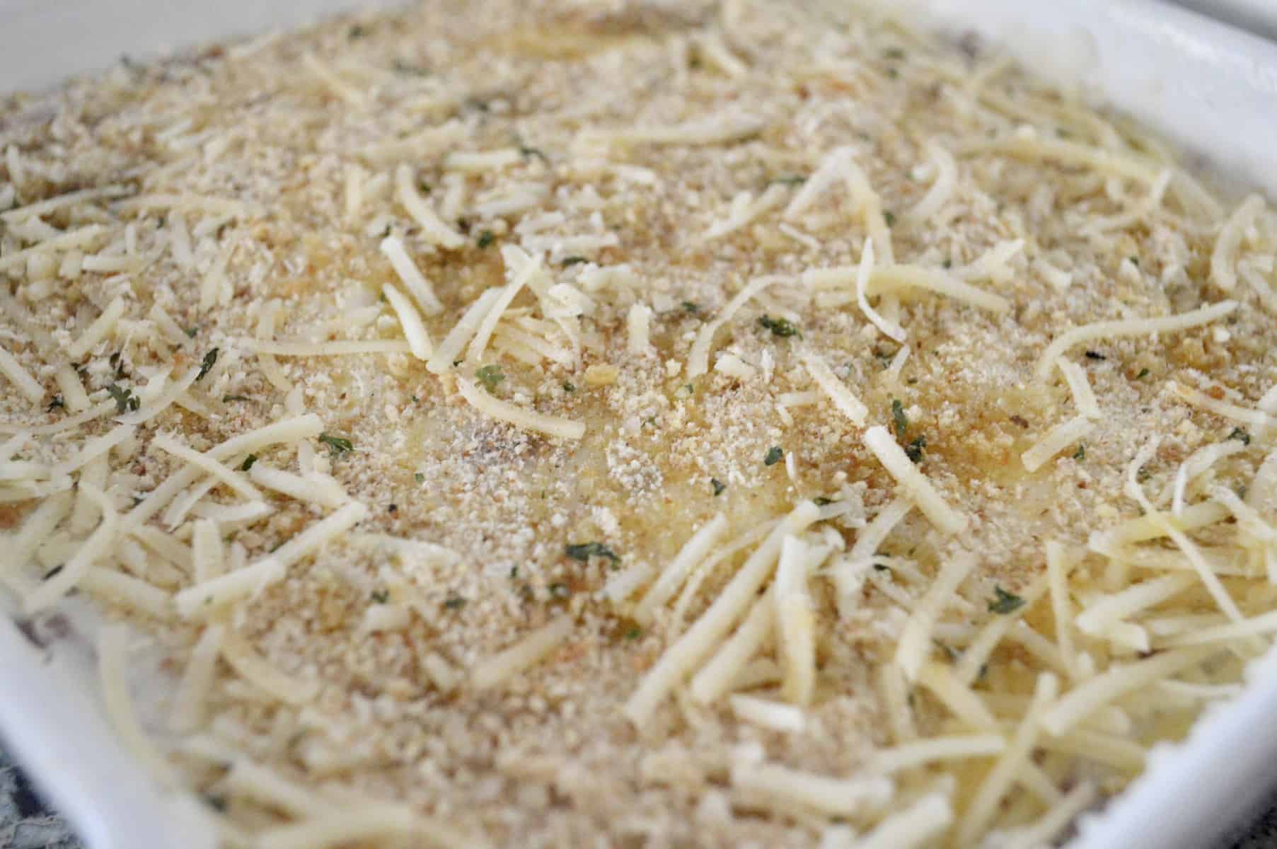 Cheese and bread crumbs sprinkled over the casserole. 