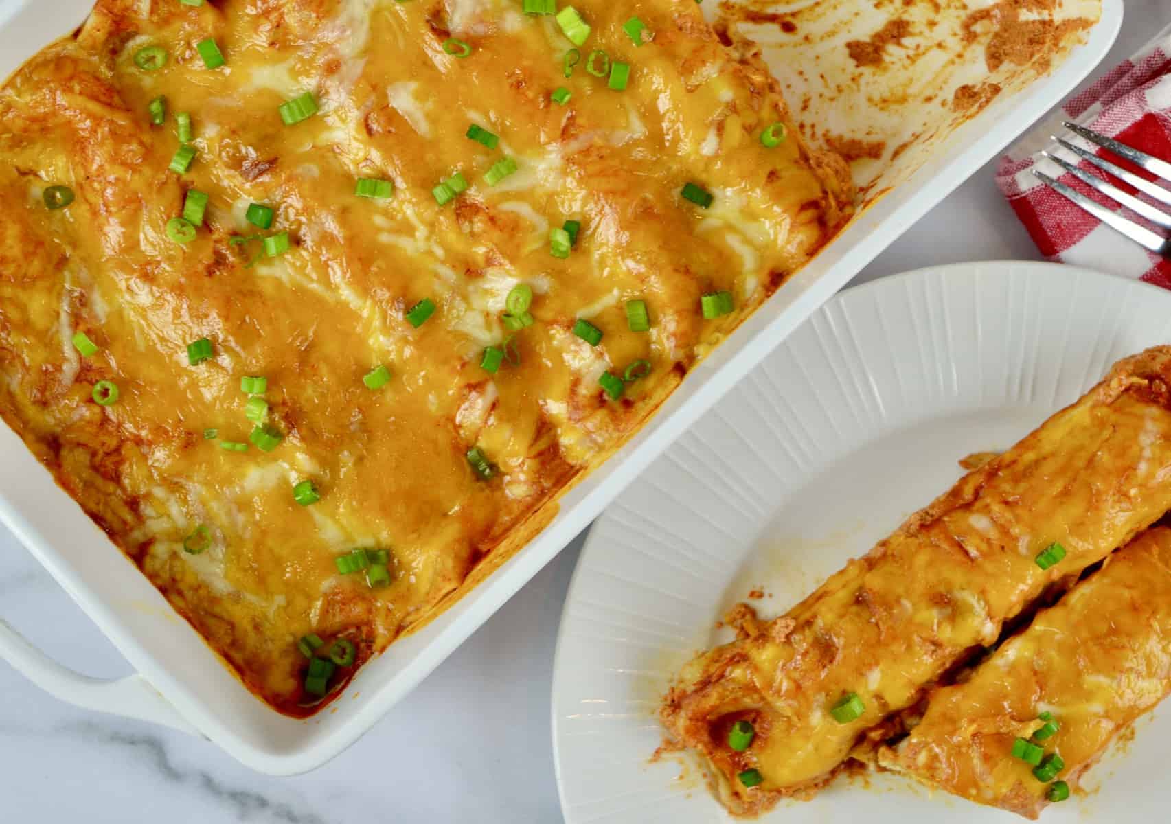 Cream Cheese Chicken Enchiladas on a plate