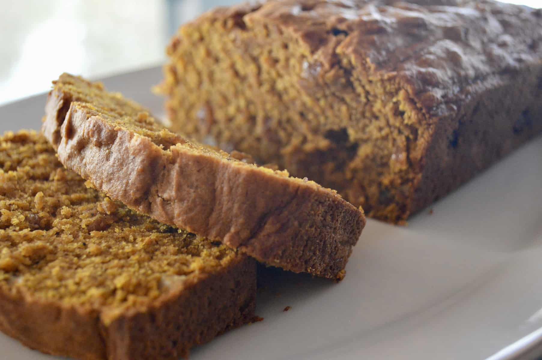 Pumpkin Walnut Raisin Bread is an easy pumpkin bread recipe that is moist and better than Starbucks! Best brunch recipes. #pumpkinbread #pumpkinloaf #fall #recipe #baking #walnuts #goldenraisins #easy #starbucks #healthy #pumpkin #brunch #fallgift #gifting #giftbasket