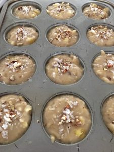 tropical muffins batter in muffin tin