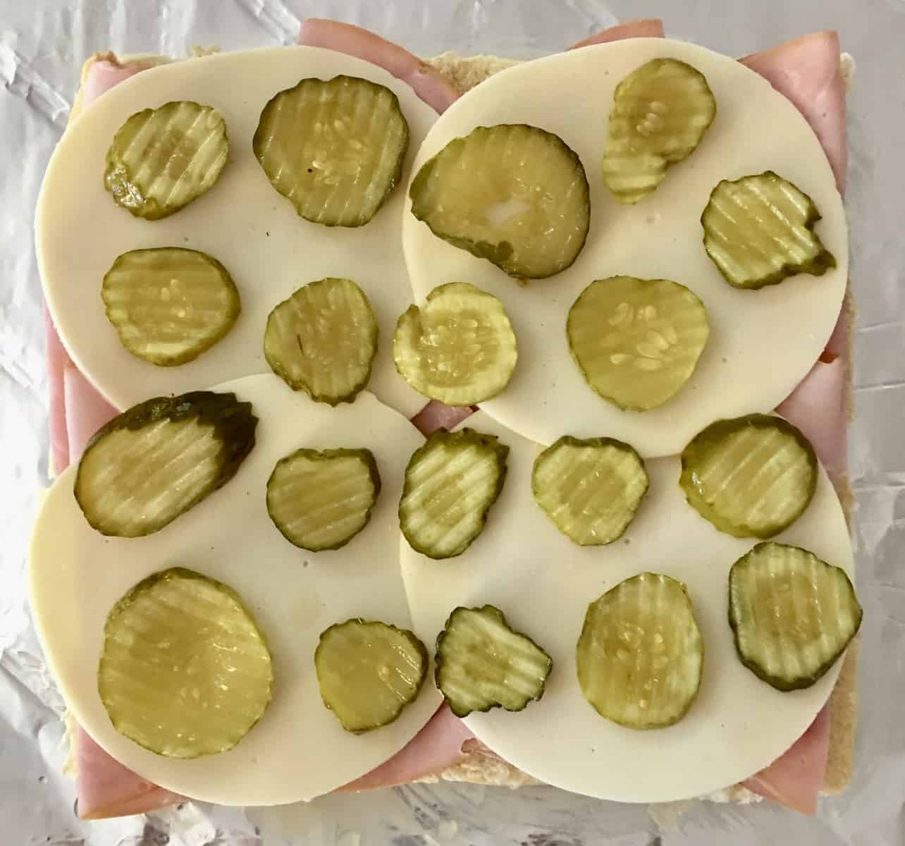 ham, provolone and pickles on king's Hawaiian rolls 