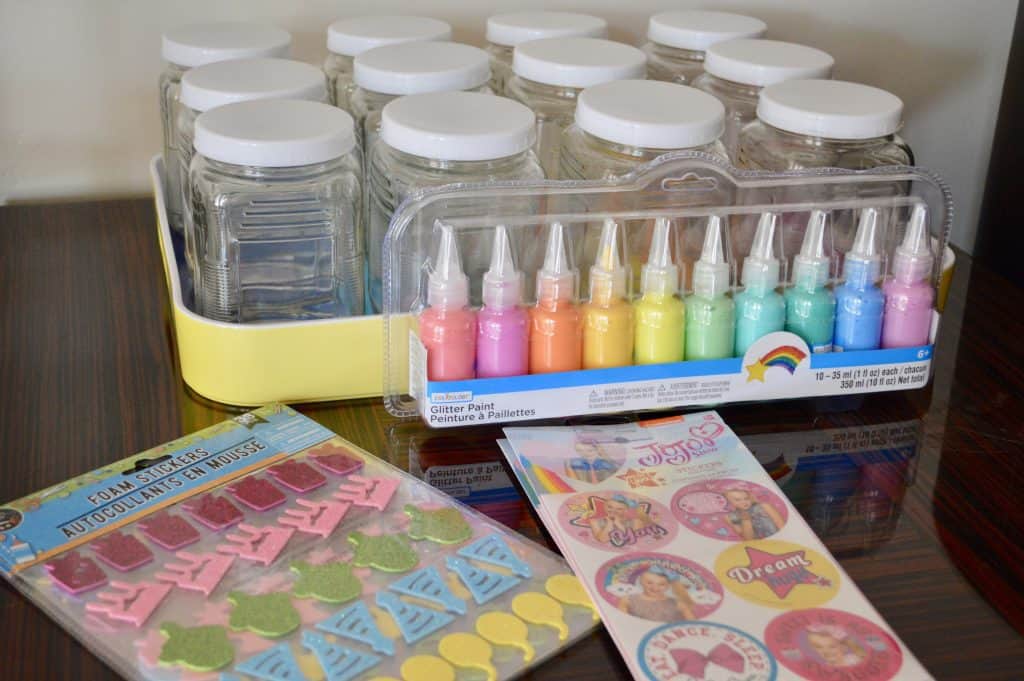 set up of puffy paint, jars, and stickers 