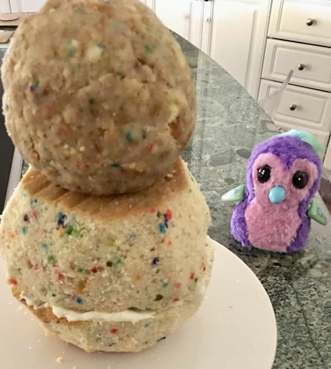 unfrosted body of the Hatchimals Cake