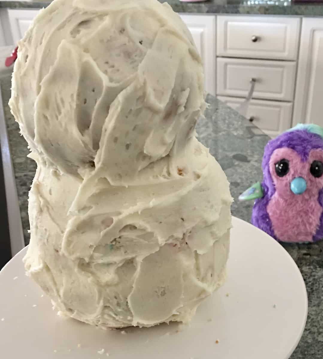 Hatchimals Cake body cover in crumb coat frosting