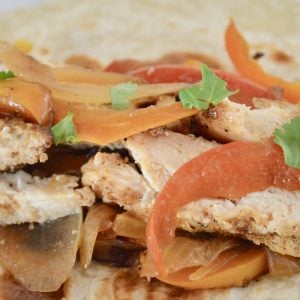 Taco Bar Ideas and recipes include grilled fajita chicken with bell peppers and onions