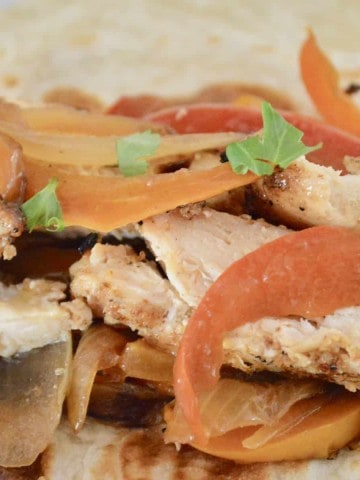 Taco Bar Ideas and recipes include grilled fajita chicken with bell peppers and onions