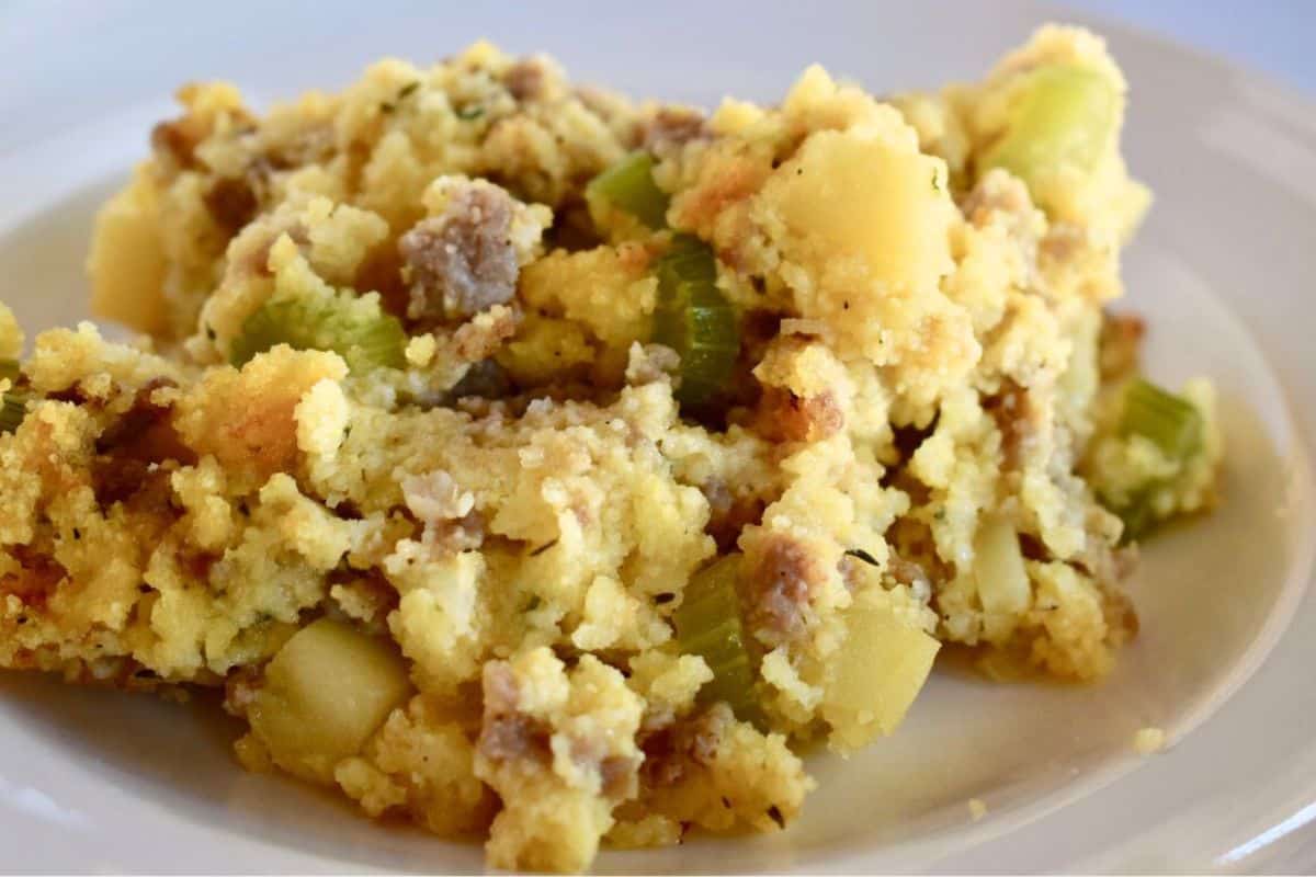 Plate of jimmy dean cornbread stuffing with sausage, apple, celery, and onion. 
