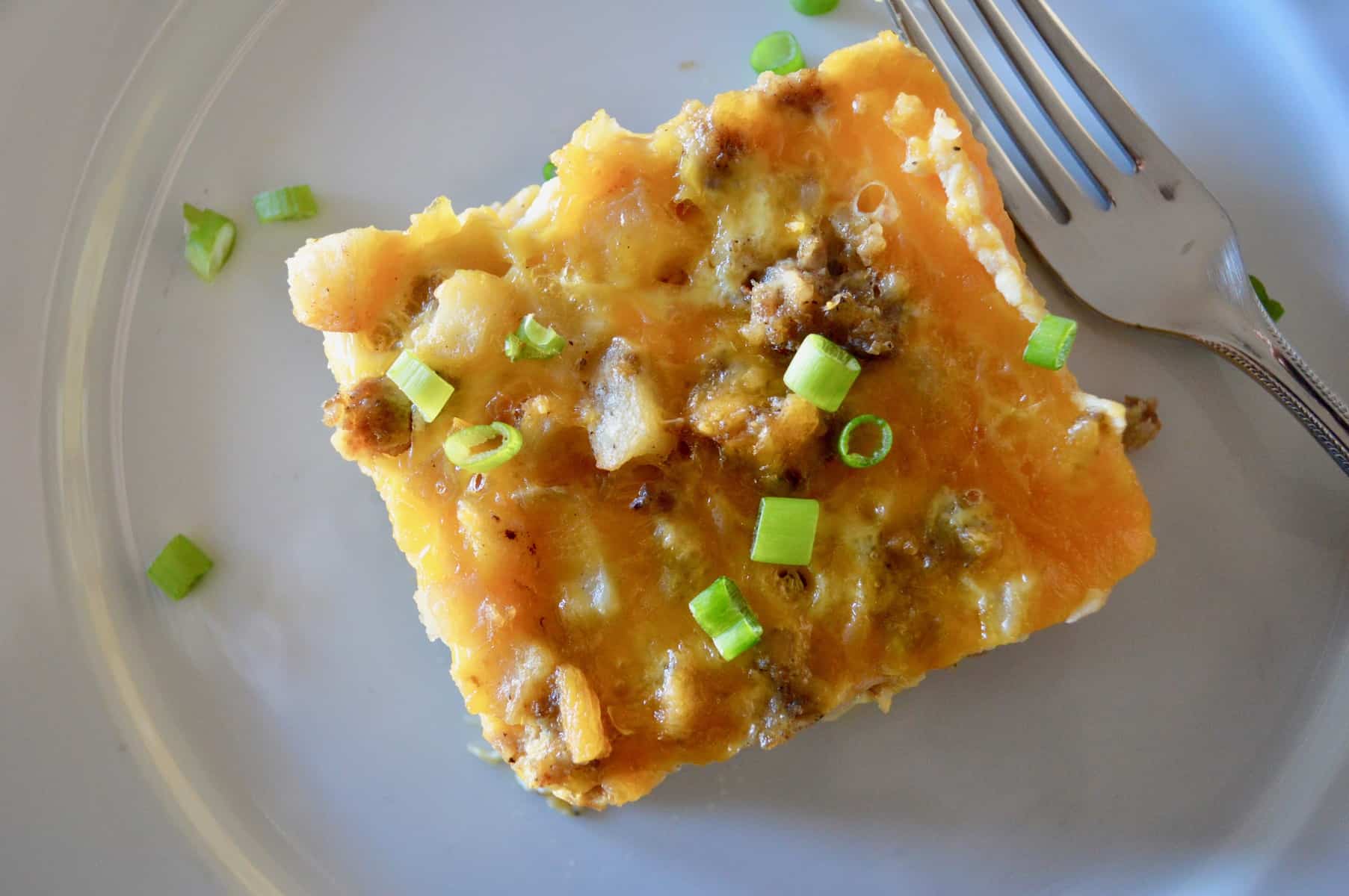 slice of breakfast casserole on a white plate 