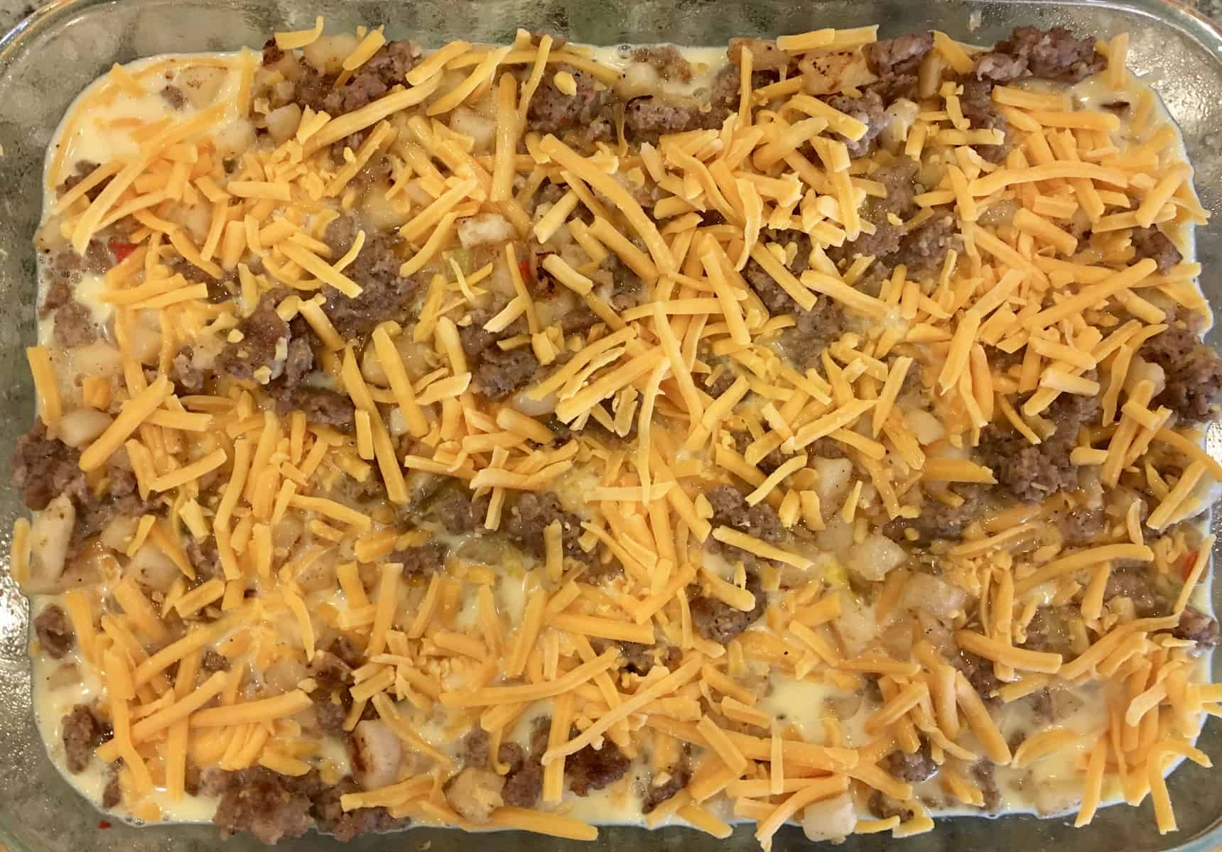 add the cheese overtop of the bake. 