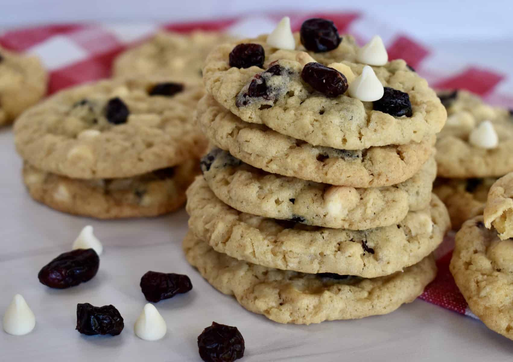 White Chocolate Cranberry cookies stacked on each other. 