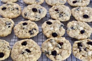 White Chocolate Cranberry cookies cooling on a cooling rack.