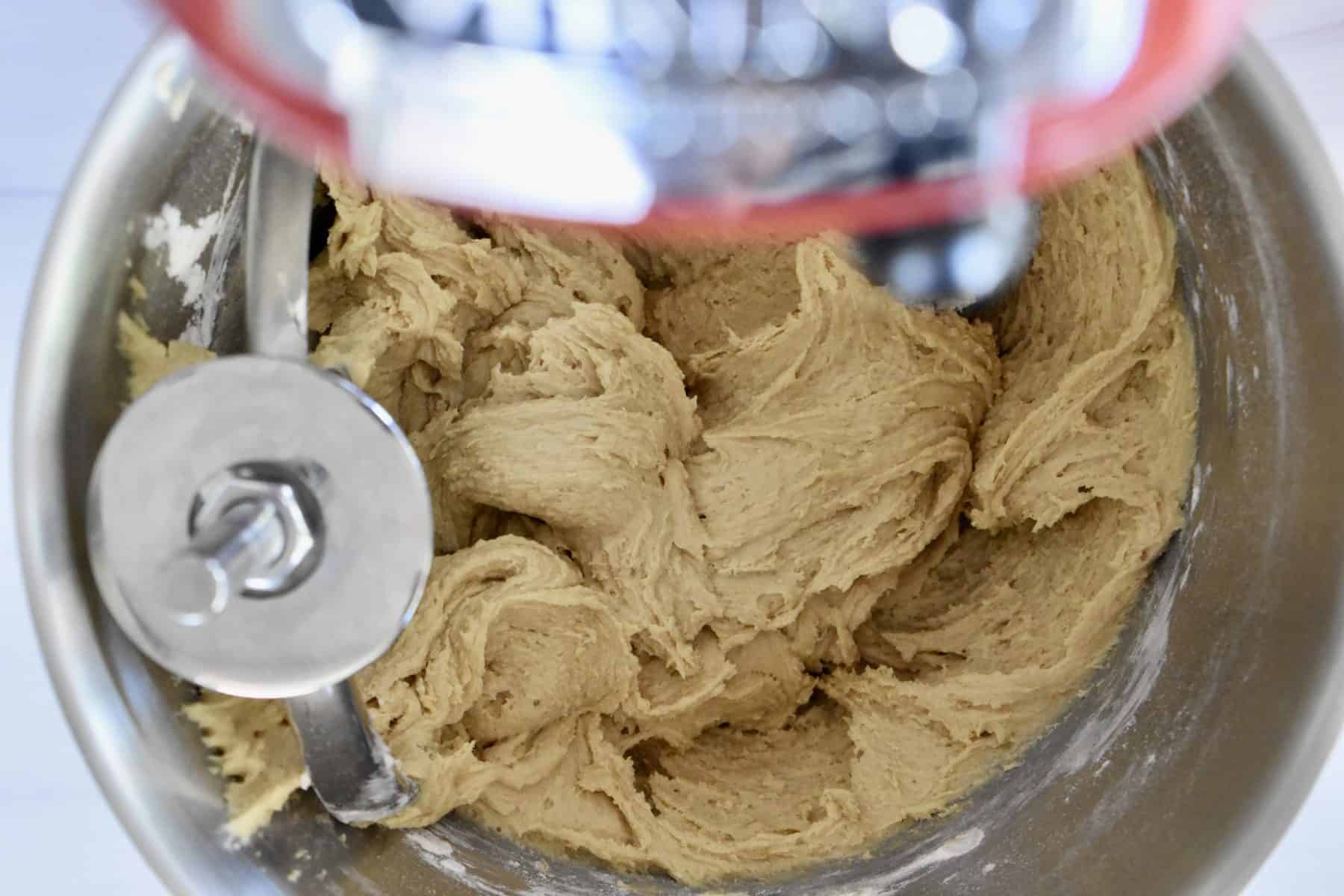 overhead photo of batter in the stand up mixer. 