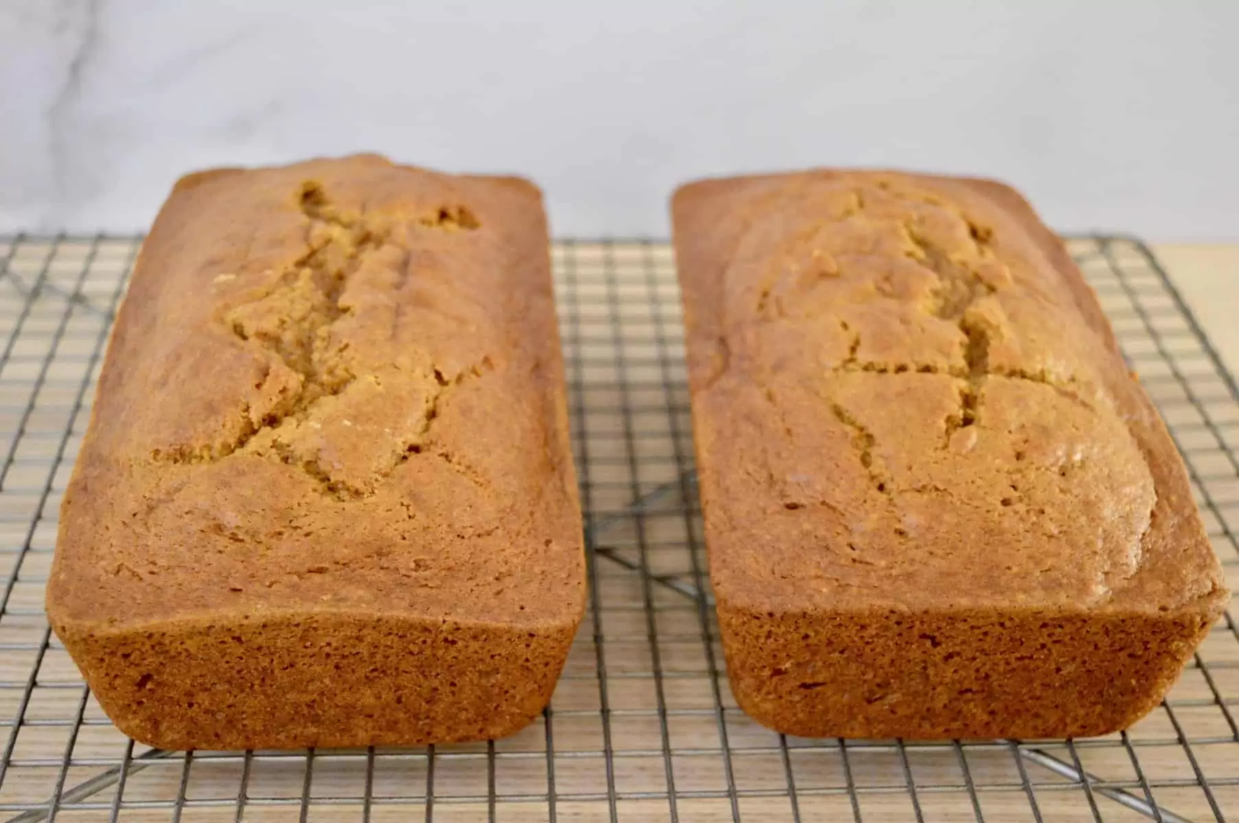 loaves cooling on a cooling rack. 