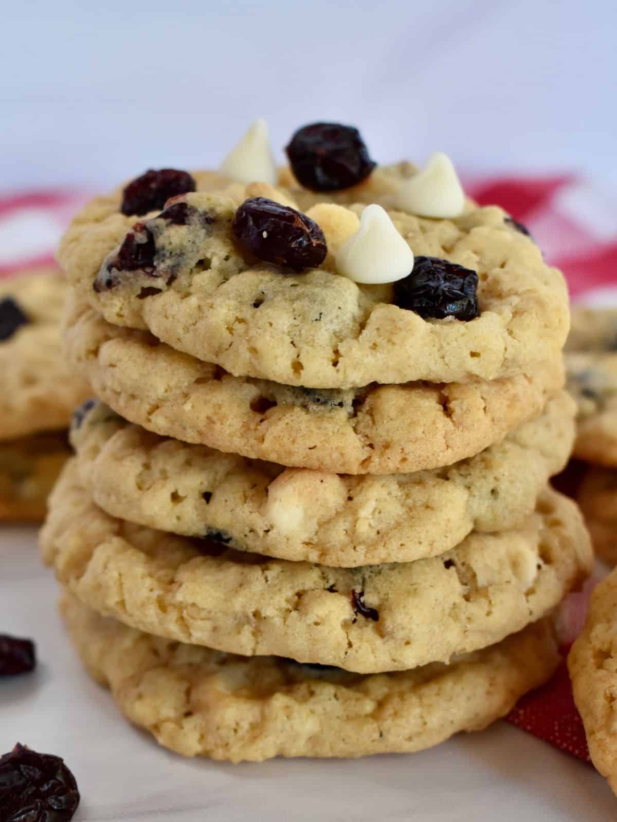 Oatmeal Craisin Cookies stacked on each other. 