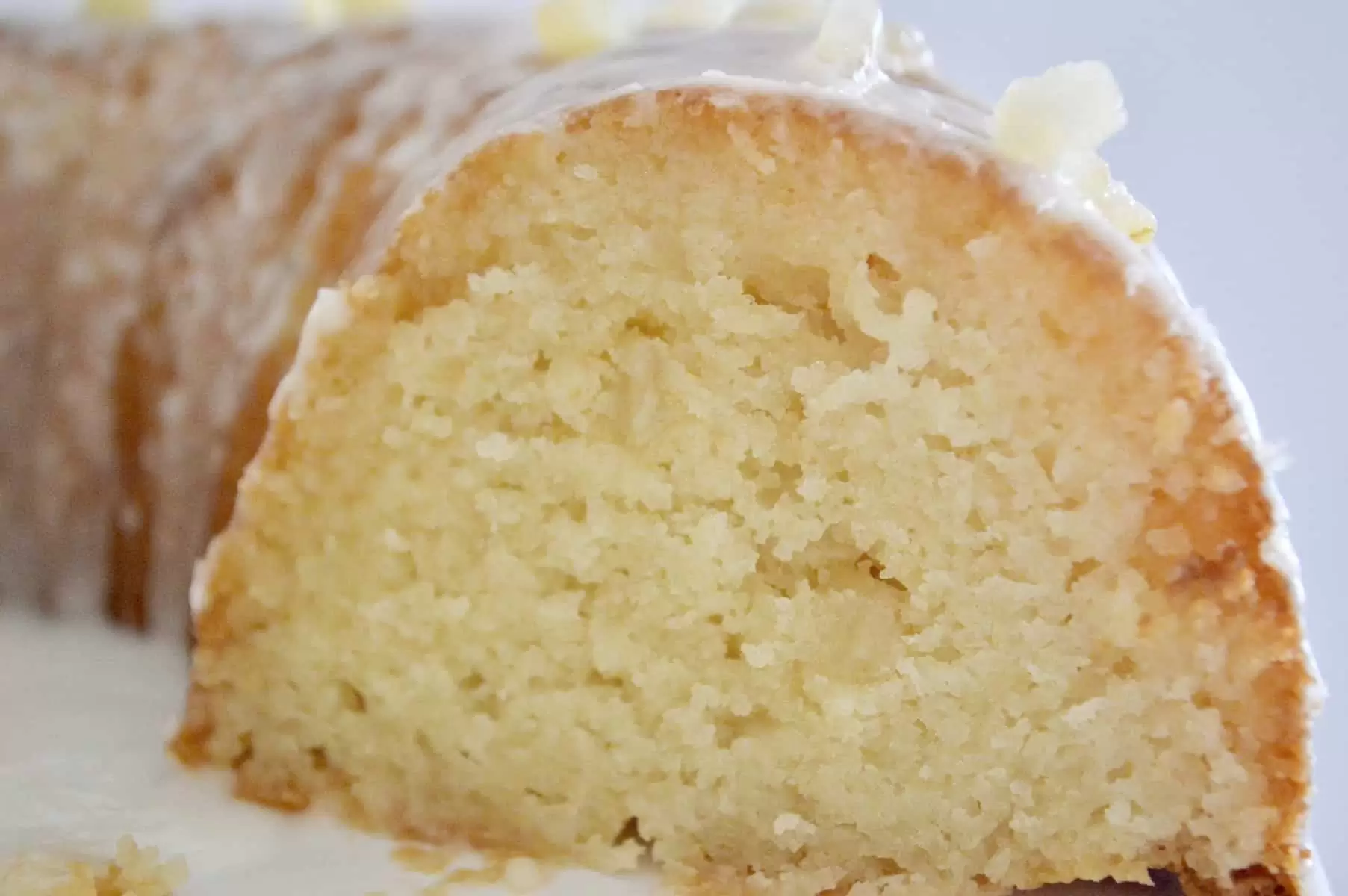 lemon ricotta bundt cake with candied lemon peel