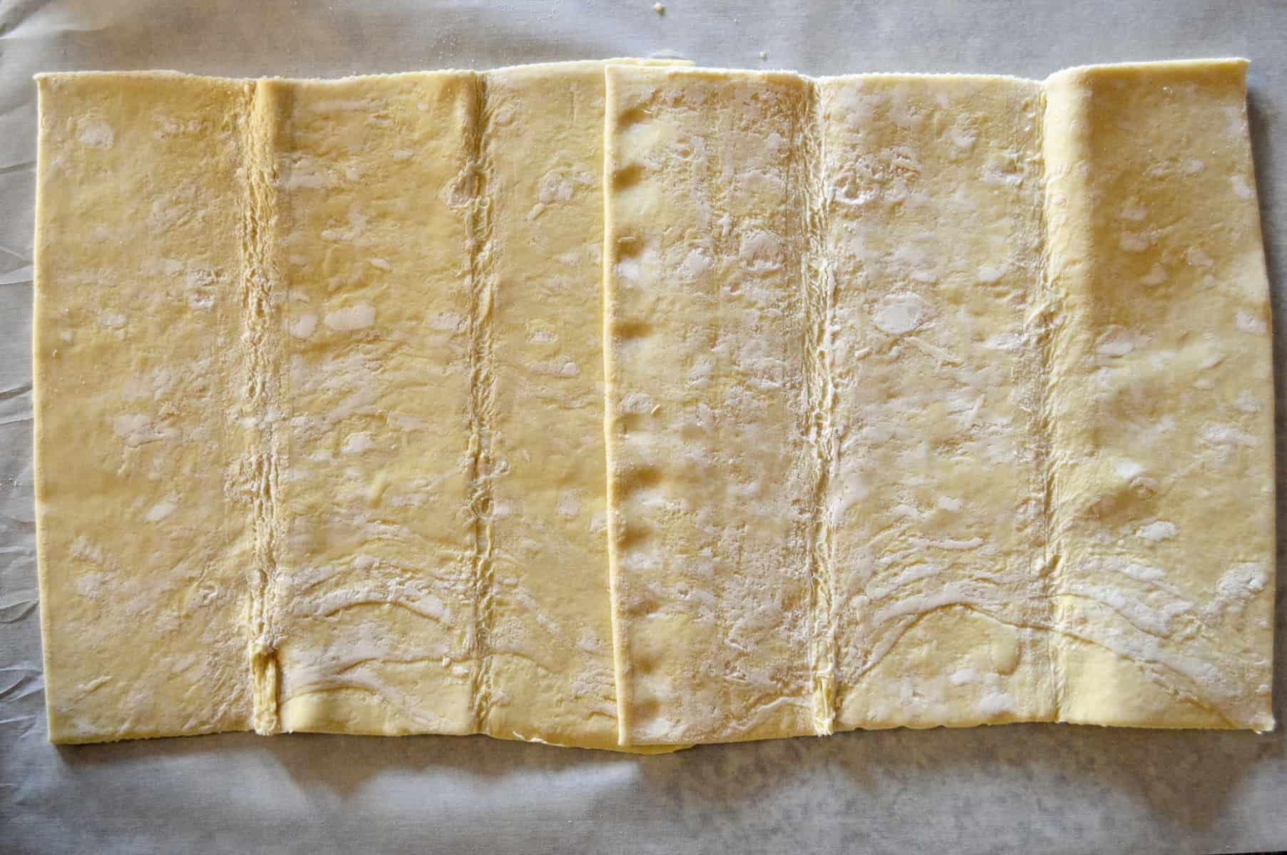 puff pastry sheets overlapping slightly for Salmon Wellington 