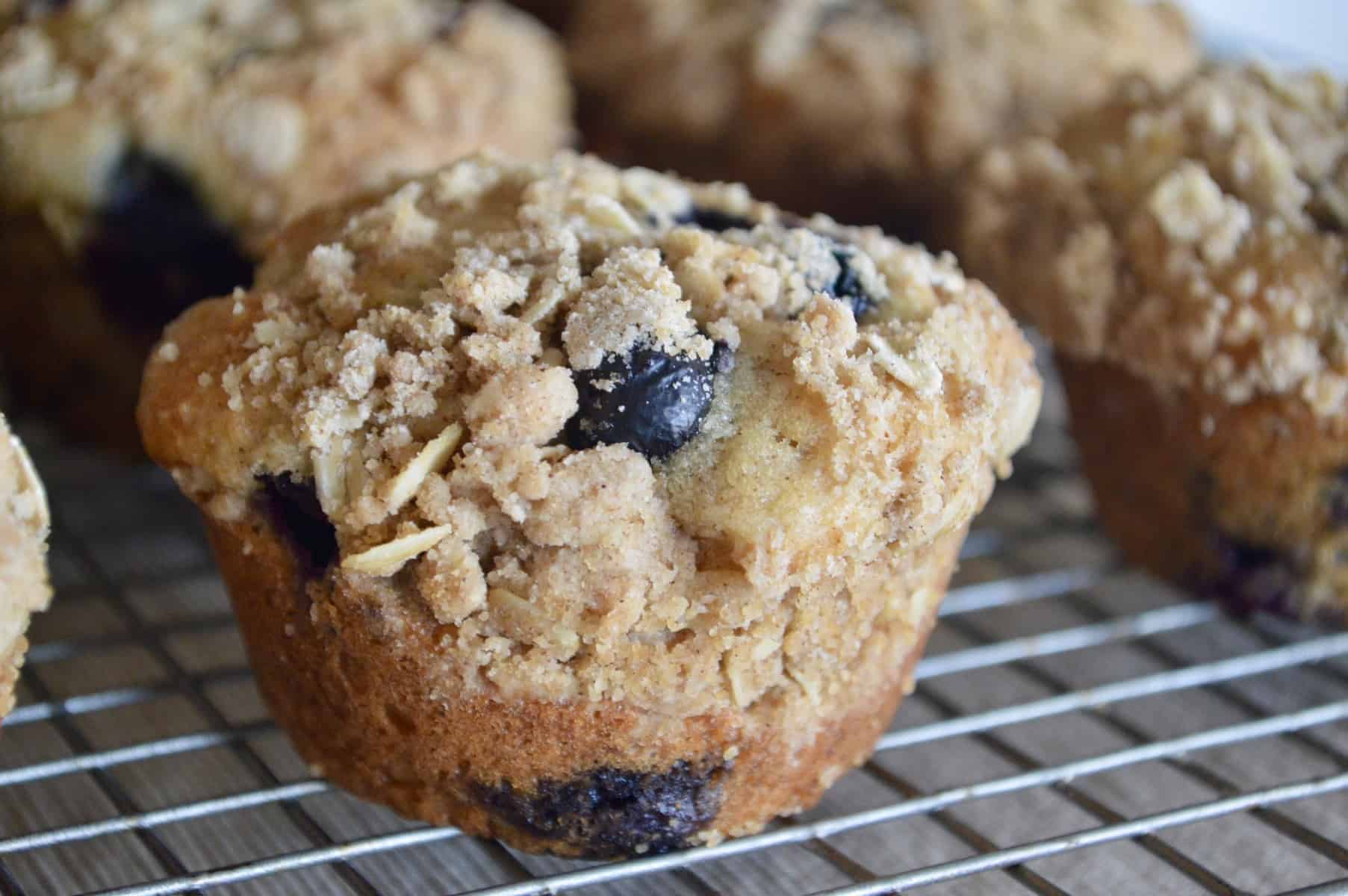 Blueberry Streusel Muffin cooling on a wire rack