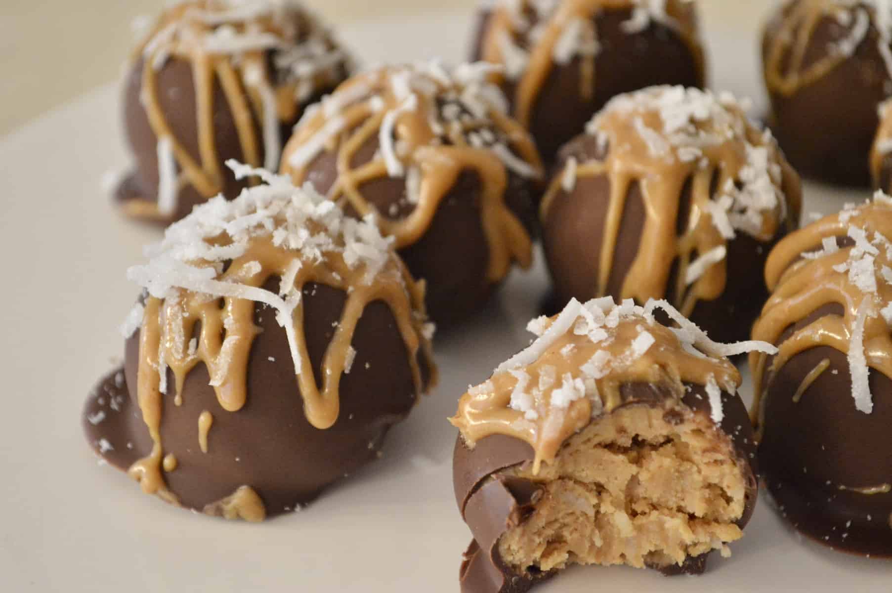 Peanut Butter Coconut Truffles on a white plate