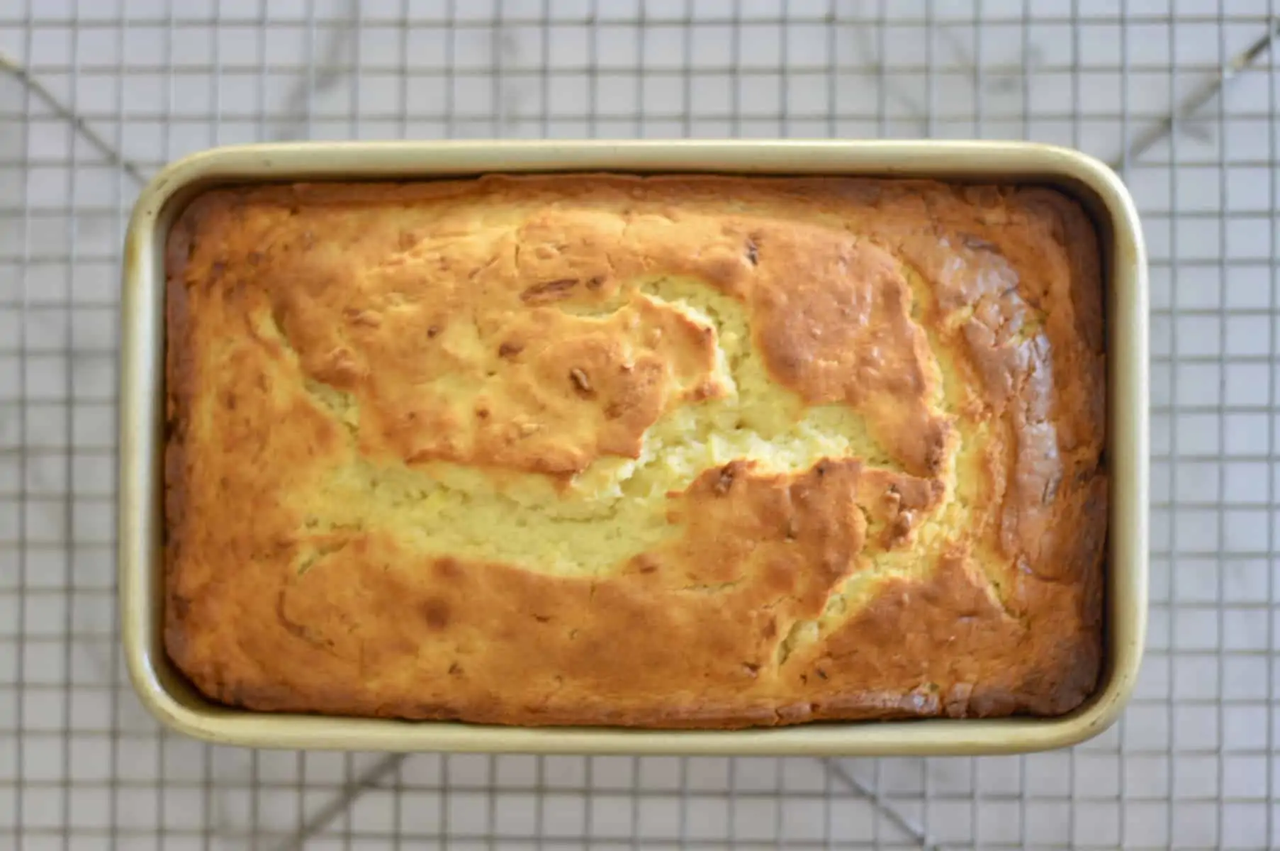 summer squash bread cooling on a wire rack