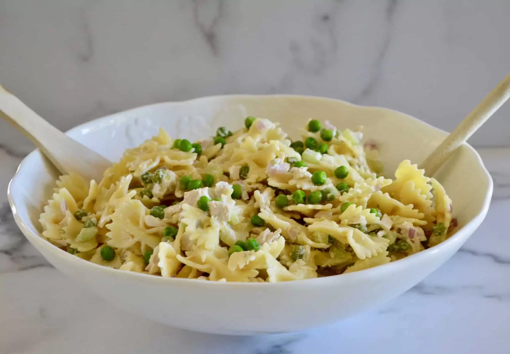 pasta salad in a white bowl