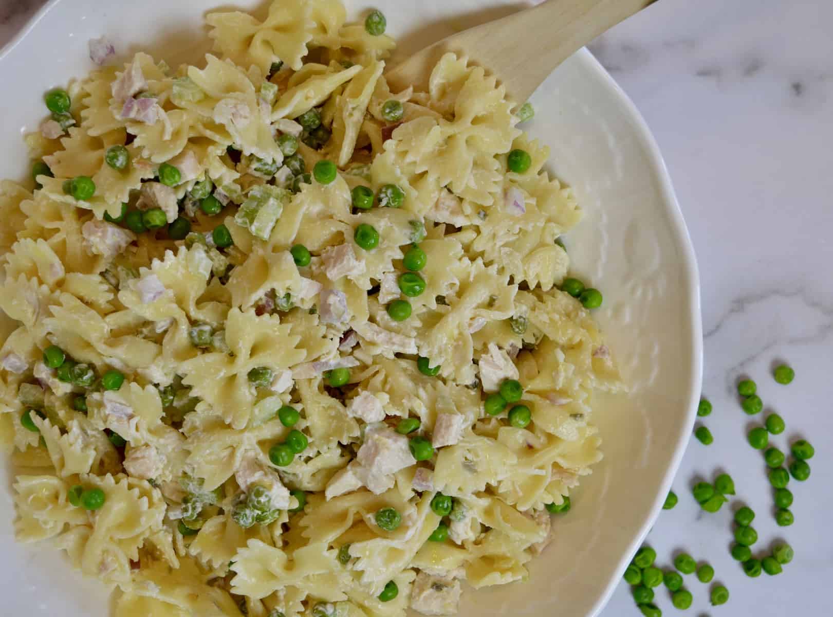 Rotisserie Chicken Pasta salad in a white bowl 