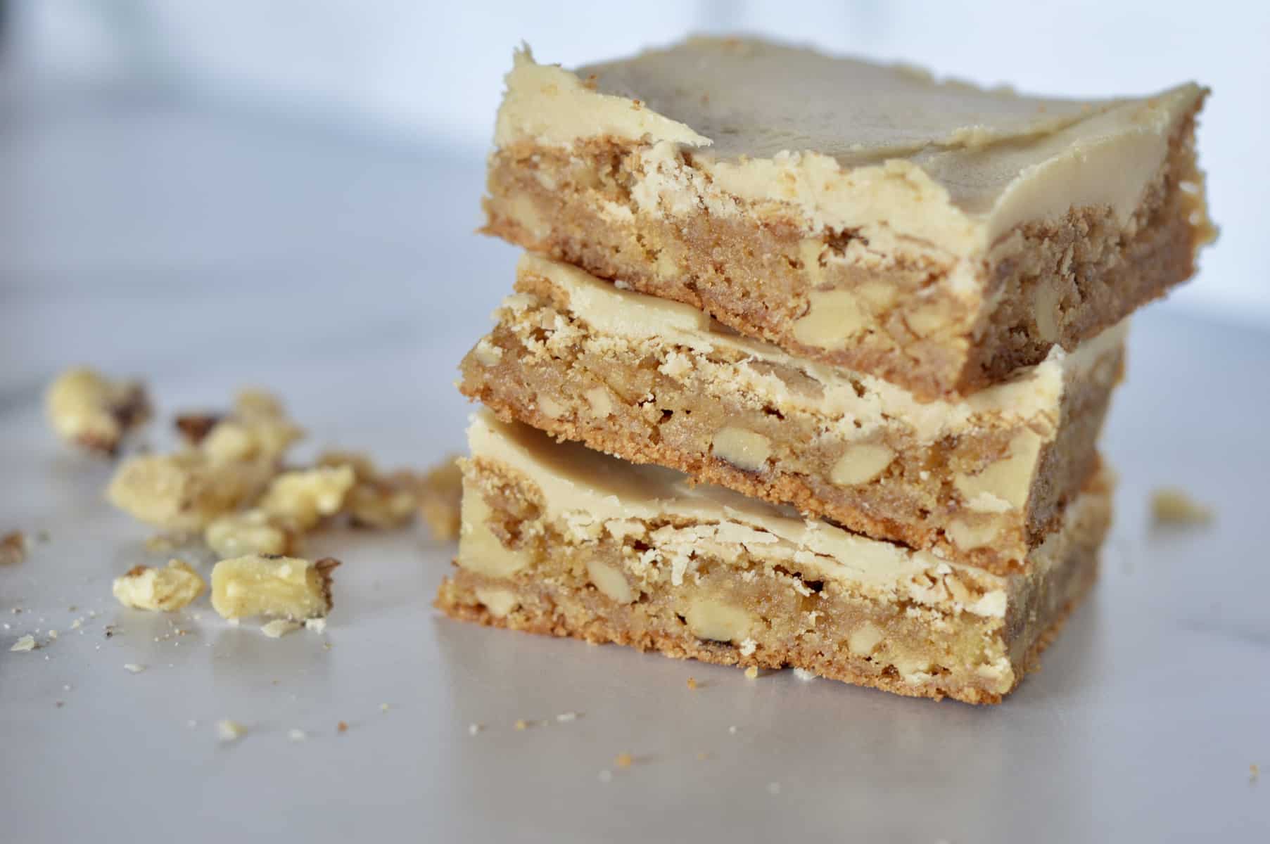 butterscotch blondies stacked on a counter 