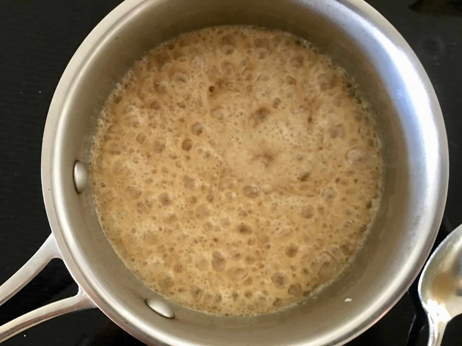 bubbling brown sugar mixture to make brown sugar frosting