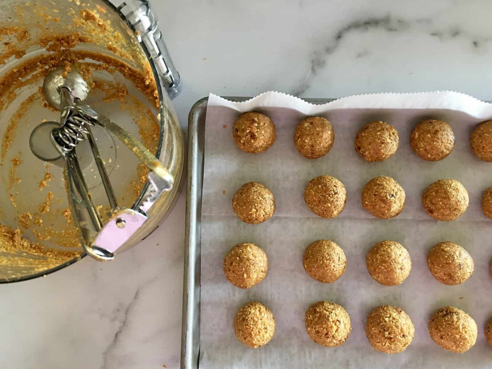 carrot cake energy balls rolled out on parchment 