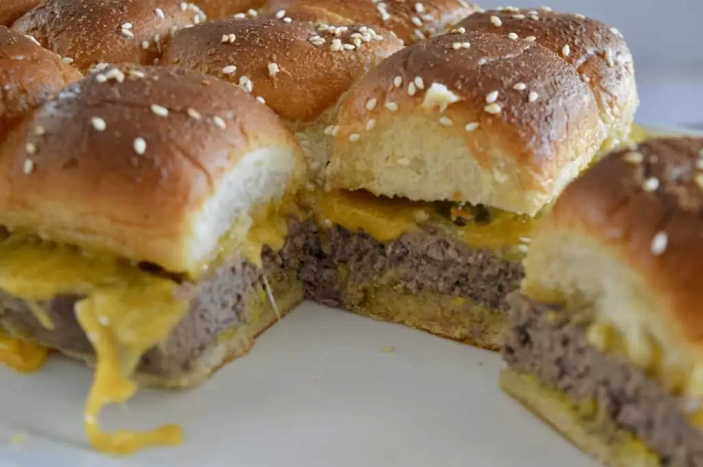 Easy Baked Cheeseburger Sliders on a white platter.