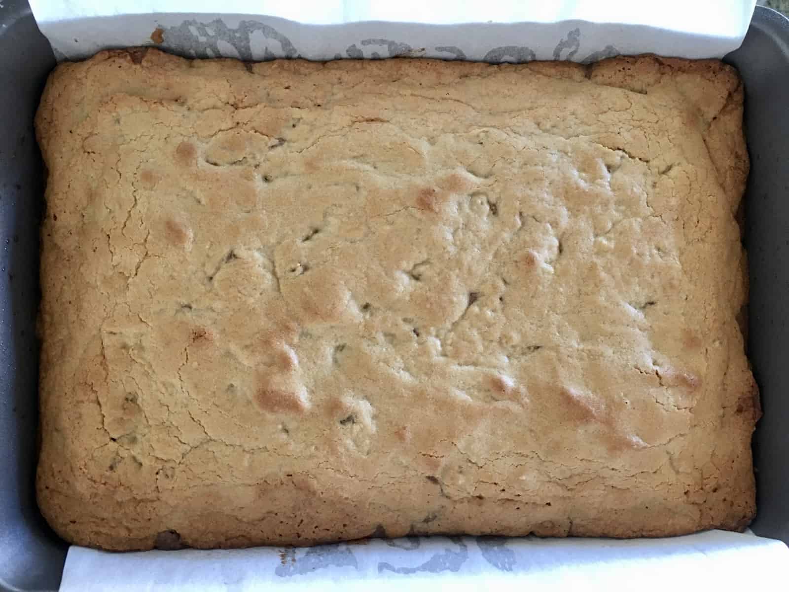 Baked Brownie Blondie Bars in the pan cooling. 