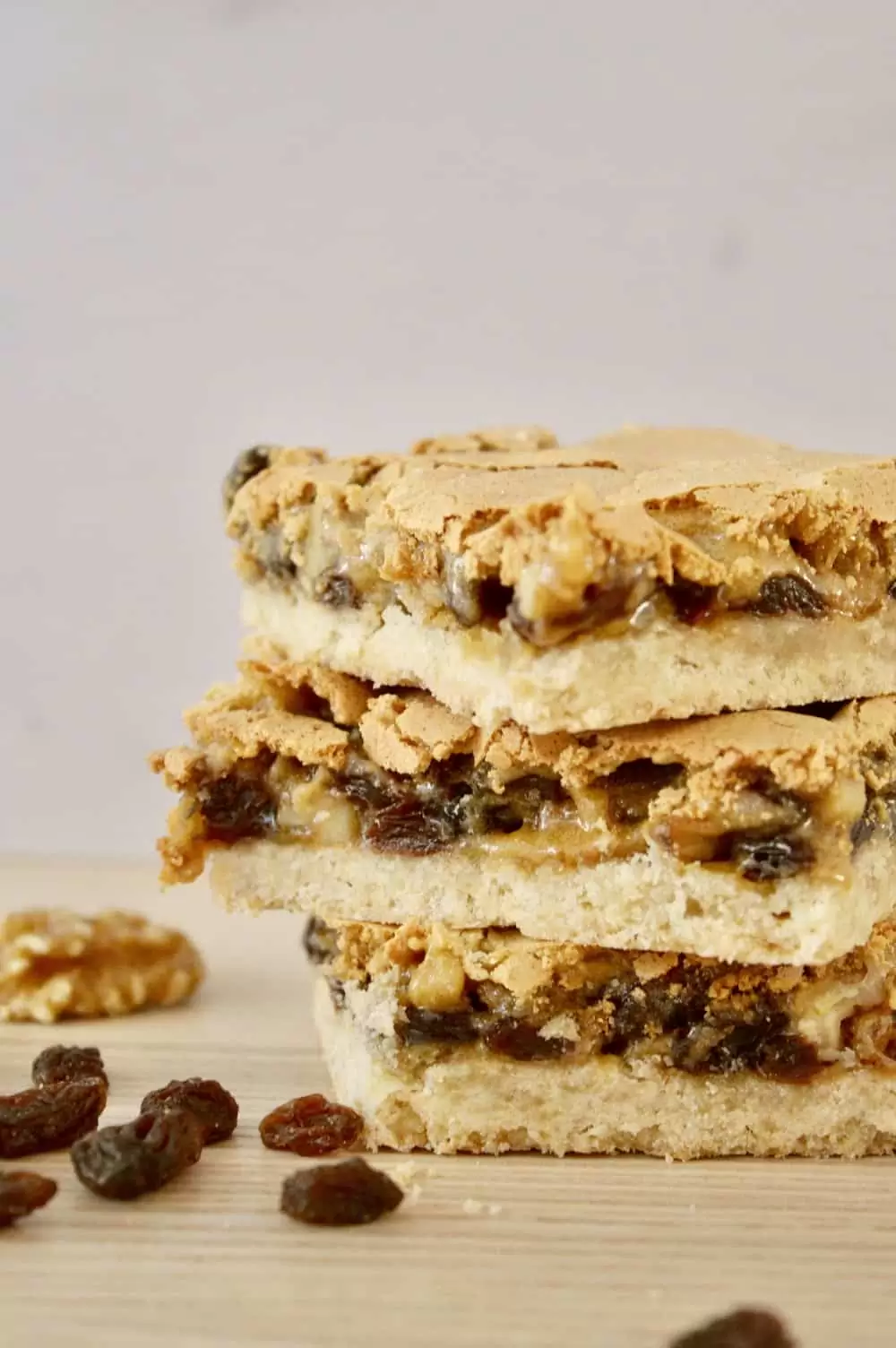 butter tart squares staked on each other. 