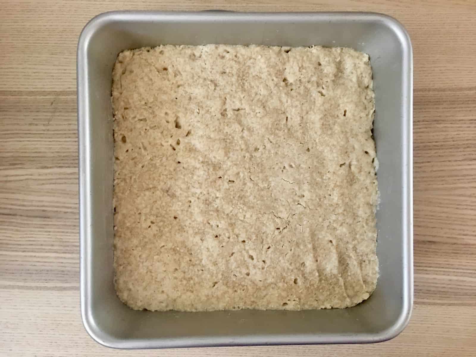 shortbread mixture baked in the bottom of a 9 x 9 inch baking pan. 