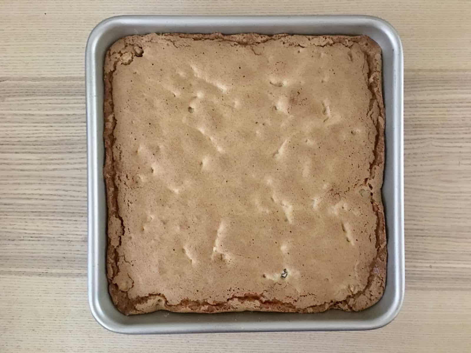 Baked butter tart squares in a 9 x 9 inch baking pan. 