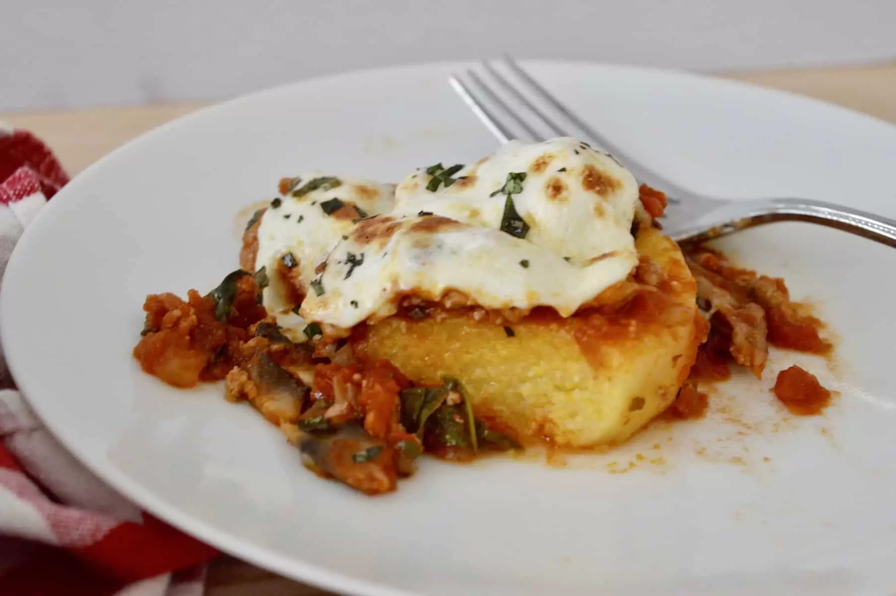 Close up of piece of Italian polenta skillet. 