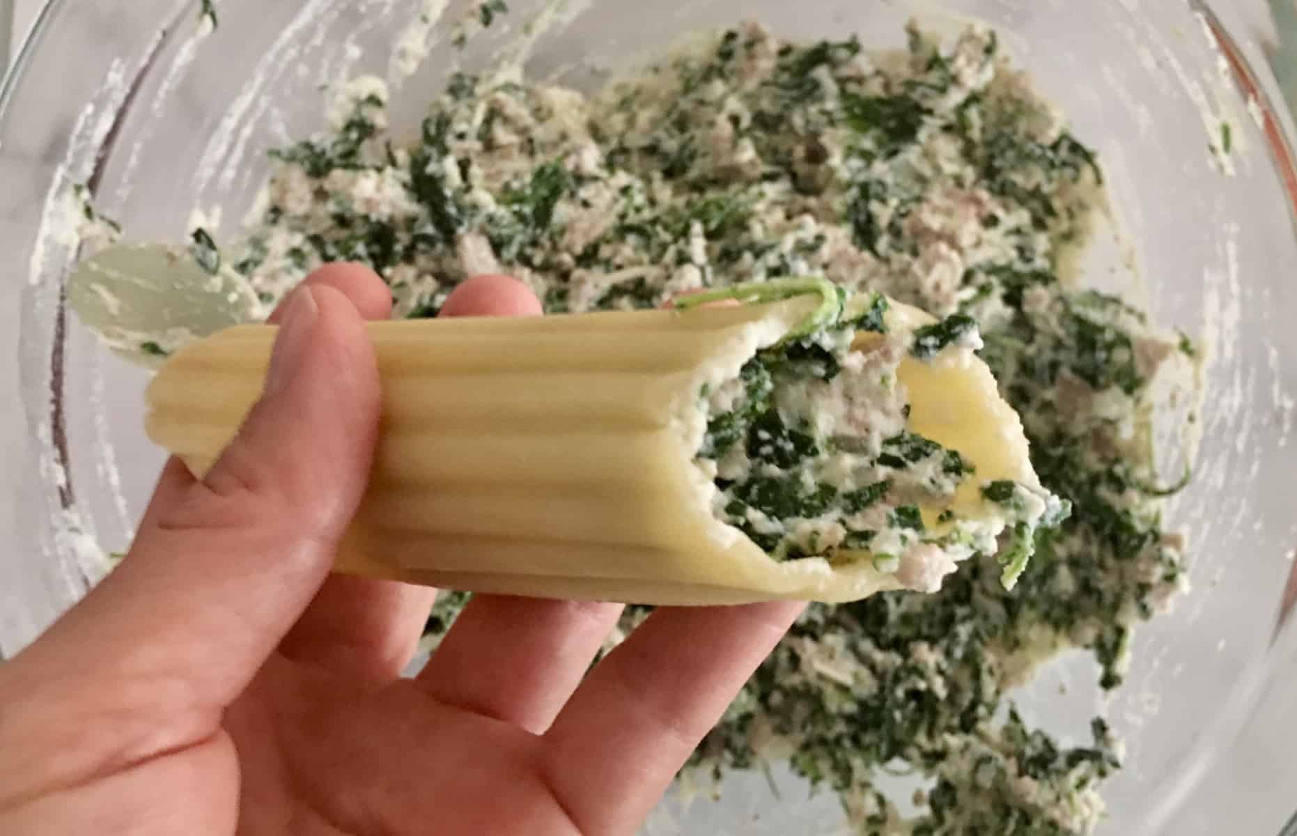 manicotti shell filled with turkey spinach ricotta filling. 