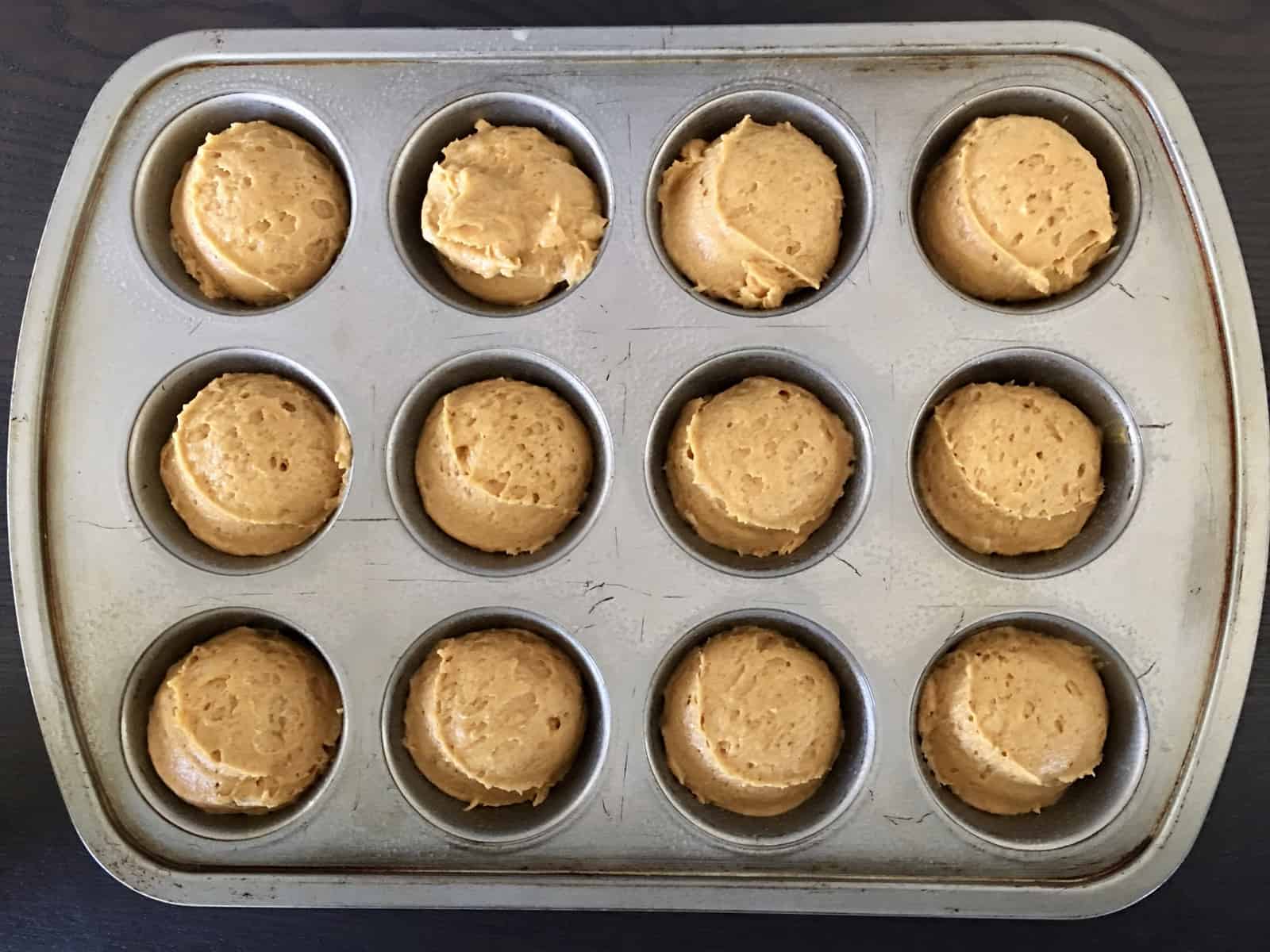 batter in muffin tin.