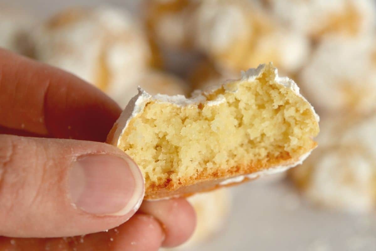 inside of an amaretti cookie being held. 