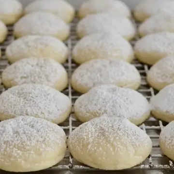 Greek Butter Cookies on a cooling rack.